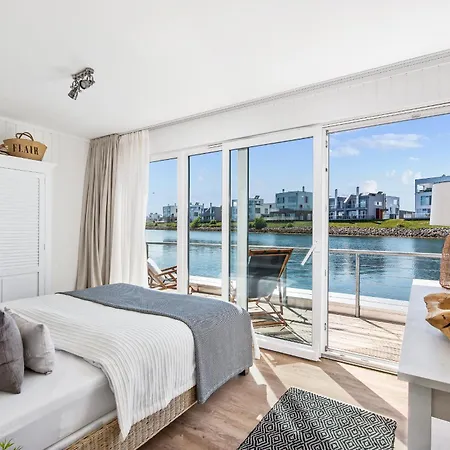 Treibholz: Meerblick, Dachterrasse, Bootsanleger, Badeleiter, Sauna Feriehus