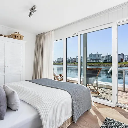 Treibholz: Meerblick, Dachterrasse, Bootsanleger, Badeleiter, Sauna Сasa de vacaciones Olpenitz