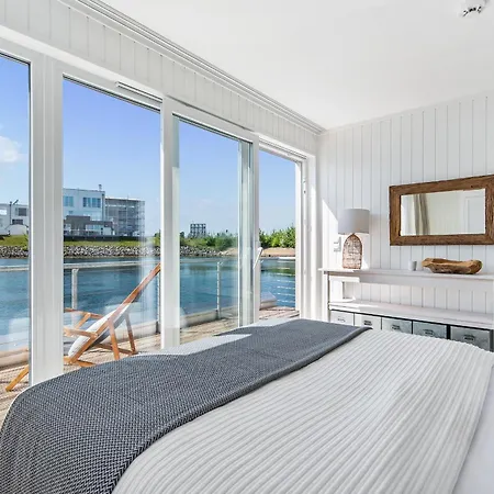 Feriehus Treibholz: Meerblick, Dachterrasse, Bootsanleger, Badeleiter, Sauna *