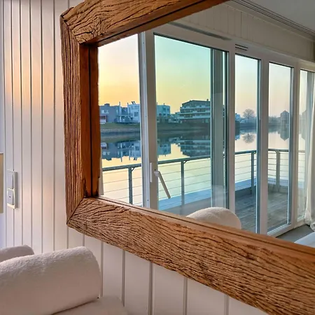 Treibholz: Meerblick, Dachterrasse, Bootsanleger, Badeleiter, Sauna Сasa de vacaciones Olpenitz