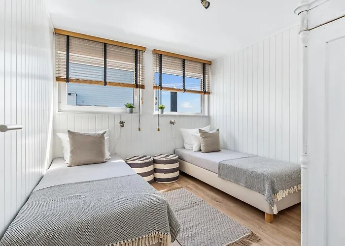 Treibholz: Meerblick, Dachterrasse, Bootsanleger, Badeleiter, Sauna Hébergement de vacances